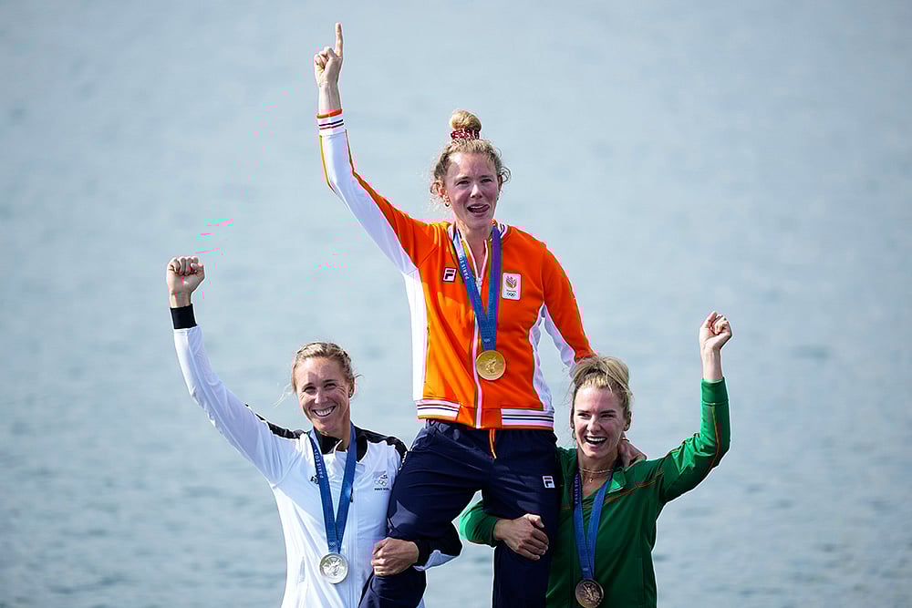 | Photo: AP/Ebrahim Noroozi : Women's single sculls rowing: Silver medalist, Emma Twigg, of New Zealand, gold medalist, center, Karolien Florijn, of Netherlands, and bronze medalist Viktorija Senkute, of Lithuania